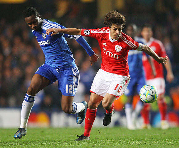 Pablo Aimar of Benfica is closed down by Chelsea's Mikel as their vie for possession during their match on Wednesday