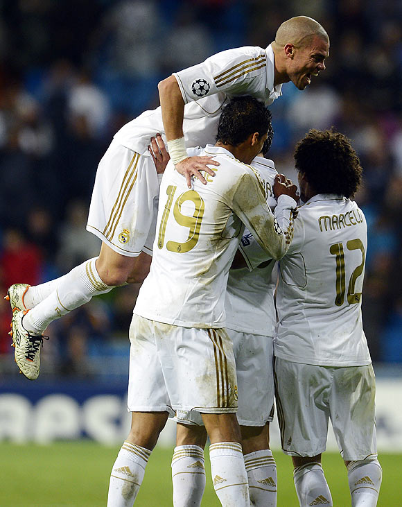 Real Madrid's players celebrate a goal during their match against APOEL on Wednesday
