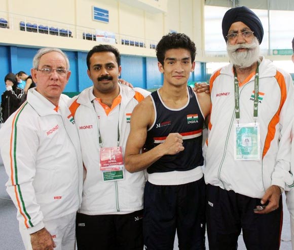 Left to right: Indian boxing team coach Blas Fernandez, physiotherapist Hari Shankar Varma, Shiva Thapa and coach Gurbax Singh Sandhu.