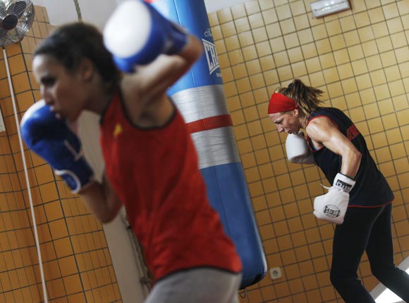 Spanish boxer Jennifer Miranda (right) and fellow boxer Yasmina Musa train