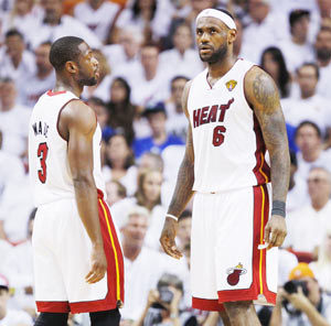 Miami Heat's LeBron James (right) and Dwyane Wade