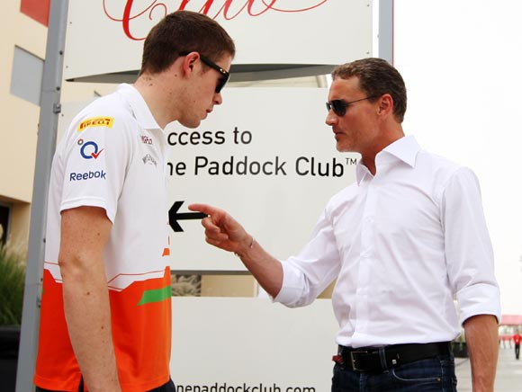 Force India driver Paul di Resta (left) speaks with former F1 driver and BBC commentator David Coulthard
