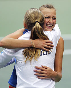 Czech Republic's Petra Kvitova and Lucie Safarova (left) celebrates the team's victory over Italy