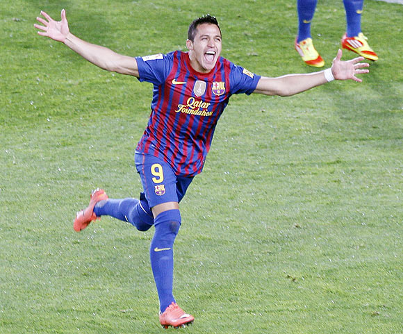 Barcelona's Alexis Sanchez celebrates after scoring the equalser against Real Madrid