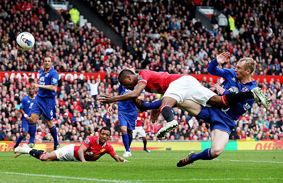 Patrice Evra of Manchester United hits the post