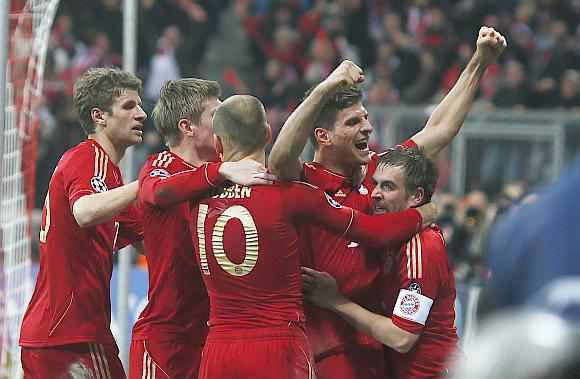 Bayern Munich players celebrate after winning the match