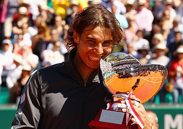 Rafael Nadal with the trophy after beating Novak Djokovic at the Monte Carlo Masters on Sunday