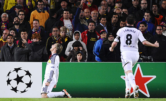 Chelsea's Fernando Torres (left) celebrates after scoring the winner against Barcelona on Tuesday