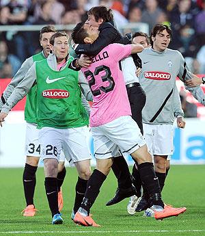 Juventus' Marco Borriello celebrates with the coach after scoring against AC Cesena during their Serie A match on Wednesday