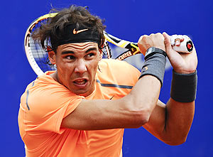 Rafael Nadal Spain returns the ball to Guillermo Garcia-Lopez during their match on day 3 of the Barcelona Open on Wednesday