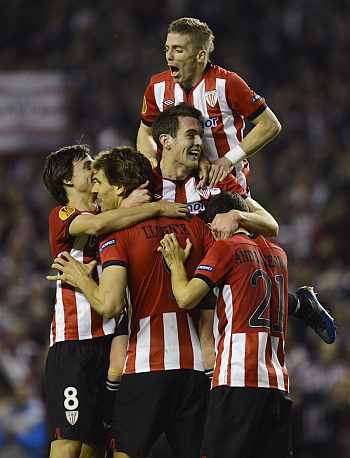 Athletico Bilbao players celebrate after winning the game