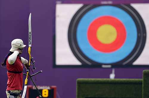India's Deepika Kumari shoots during an elimination round of the individual archery competition