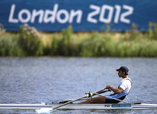 India's Sawarn Singh strokes during a men's rowing single sculls repechage