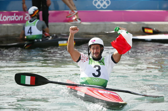 Italy's Daniele Molmenti reacts after his men's kayak (K1) finals run at Lee Valley White Water Centre during the London 2012 Olympic Games