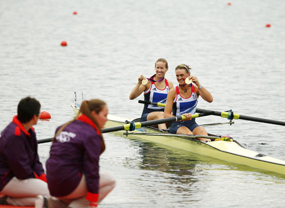 Britain's Helen Glover and Heather Stanning pose with their gold medals after the women's pair final