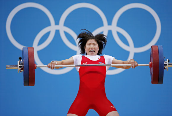 North Korea's Jong Sim Rim competes on the women's 69Kg Group A weightlifting competition