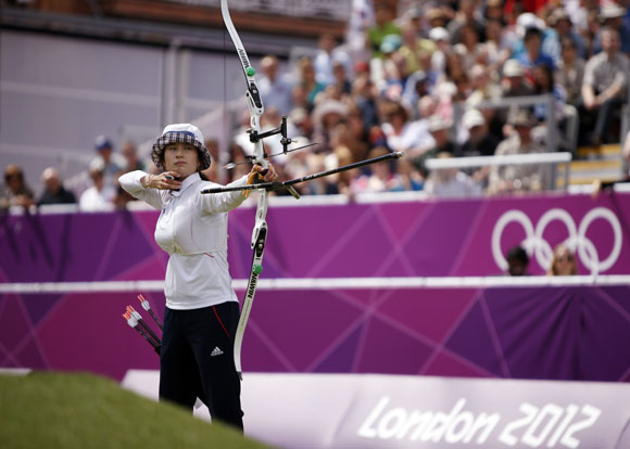 South Korea's Ki Bo-bae shoots during her women's archery individual match