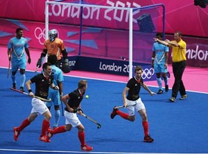 Florian Fuchs (extreme right) celebrates after scoring against India