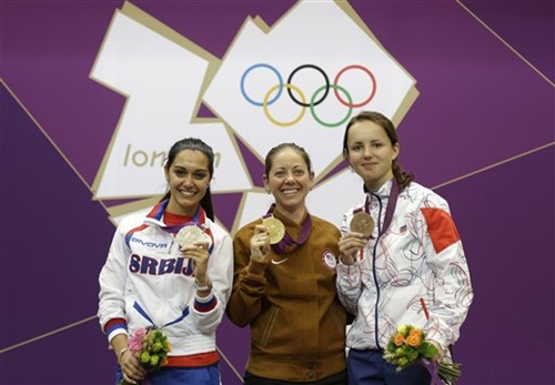 America's Jamie Lynn Gray, centre, poses for a picture with silver medalist Ivana Maksimovic of Serbia, left, and bronze medalist Adela Sykorova of Czech Republic