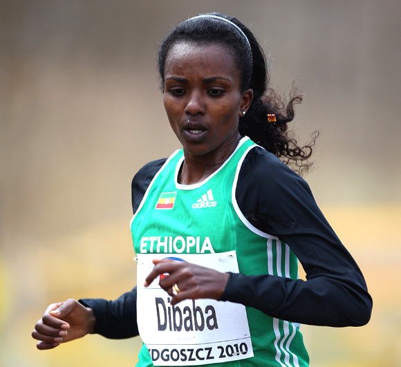 Tirunesh Dibaba of Ethiopia on her way to fourth position in the Senior Women's race during the Iaaf World Cross Country Championships