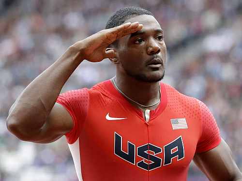 United States' Justin Gatlin reacts after his heat in the men's 100-meters