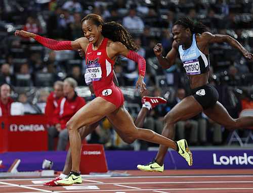 United States' Sanya Richards-Ross, front left, crosses the finish line to win gold in the women's 400-meter final