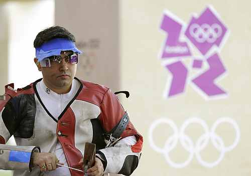 India's Gagan Narang prepares to shoot, during qualifiers for the men's 50-meter rifle 3 positions, at the 2012 Summer Olympics