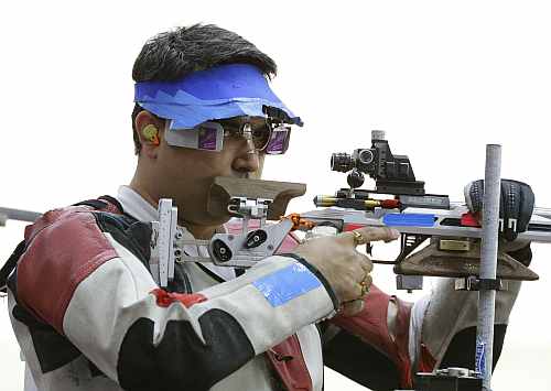 India's Gagan Narang prepares to shoot, during qualifiers for the men's 50-meter rifle 3 positions