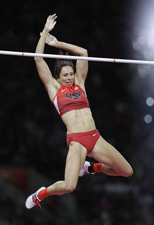 United States' Jennifer Suhr reacts as she clears the bar in the women's pole vault final