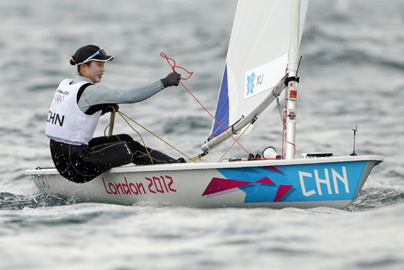 China's Xu Lijia sails during the ninth race of the Laser Radial sailing class