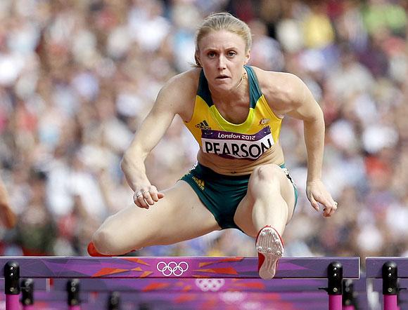 Australia's Sally Pearson competes in a women's 100-meter hurdles heat on Monday