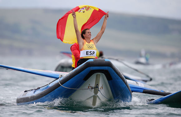 Marina Alabau Neira of Spain celebrates winning the gold medal in the RS:X Women's Sailing