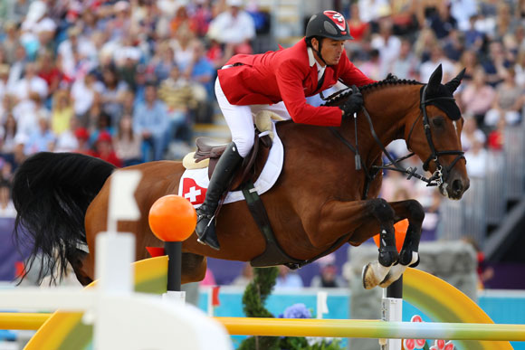 Steve Guerdat of Switzerland riding Nino Des Buissonnets competes in the Individual Jumping Equestrian