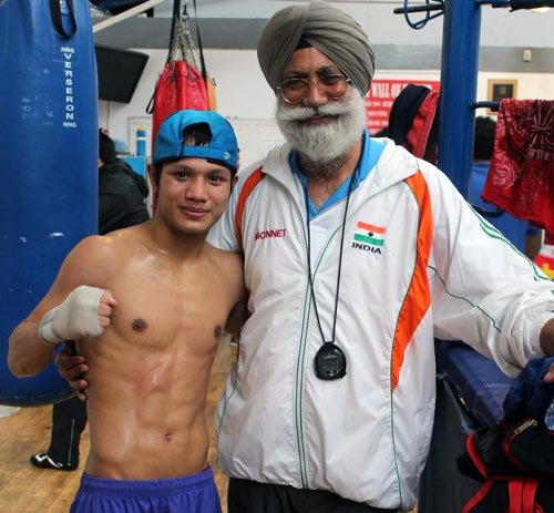 Coach Gurbax Singh Sandhu with boxer Devendro Singh