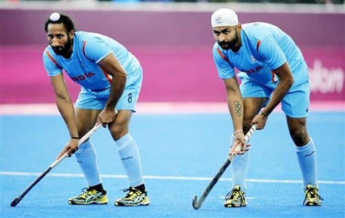 Sardar Singh (left) with Sandeep Singh