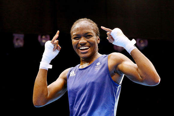 Nicola Adams of Great Britain celebrates winning her bout against Cancan Ren of China during the Women's Fly (51kg) Boxing final bout