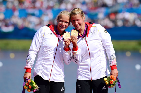 Franziska Weber and Tina Dietze of Germany celebrate winning the Gold medal in the Women's Kayak Double (K2) 500m Sprint