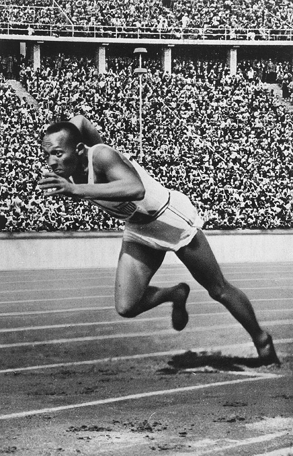 Jesse Owens of the USA at the start of the 200 metres at the 1936 Berlin Olympics which he won in 20.7 seconds, an Olympic record