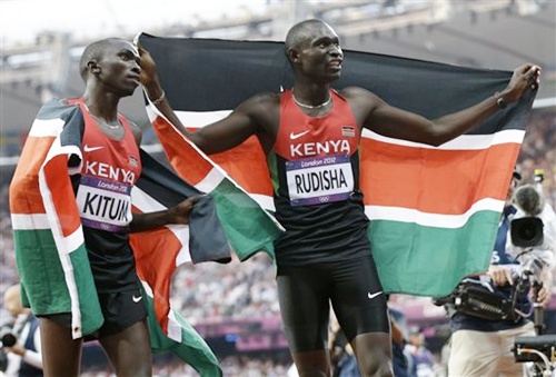 Kenya's David Lekuta Rudisha, right, and his teammate Timothy Kitum celebrate