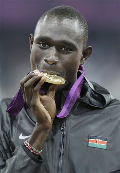 Kenya's David Lekuta Rudisha bites the gold medal