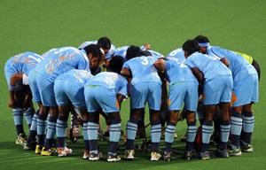 The Indian hockey team in a huddle before a match