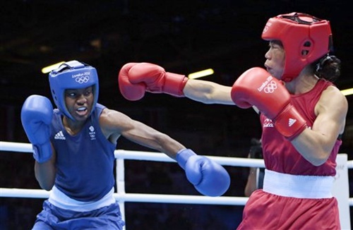 Great Britain's Nicola Adams, left, and India's Mary Kom