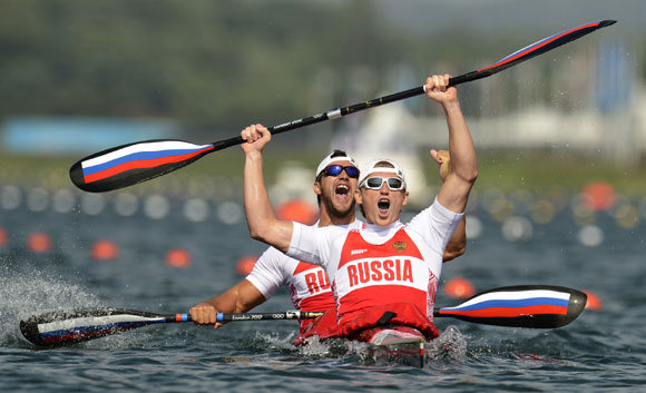 Russia's Yury Postrigay and Alexander Dyachenko celebrate after the men's kayak double (K2) 200m event