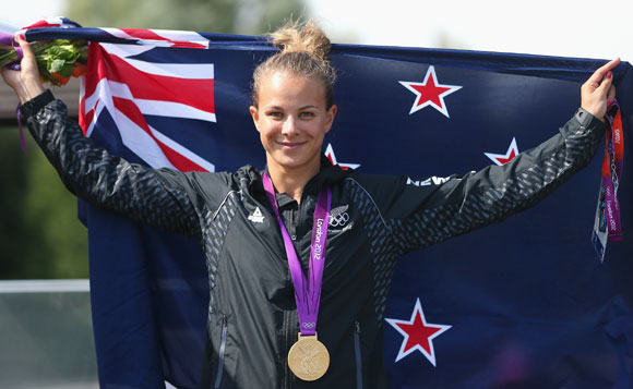 Lisa Carrington of New Zealand celebrates after winning the Gold medal in the Women's Kayak Single (K1) 200m Sprint Final