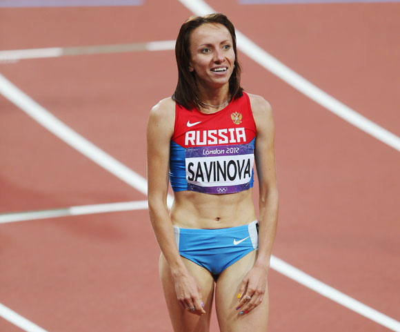 Mariya Savinova of Russia celebrates as she crosses the finish line to win gold in the Women's 800m Final