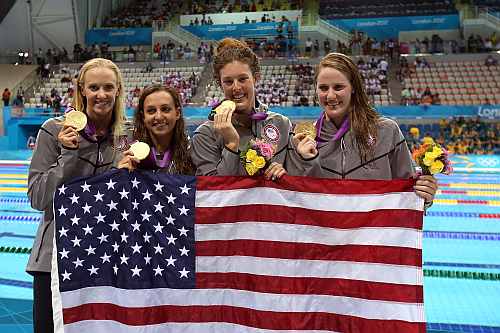 Gold medallists (L-R) Dana Volmer, Rebecca Soni, Allison Schmitt and Missy Franklin of the United States pose following the medal ceremony