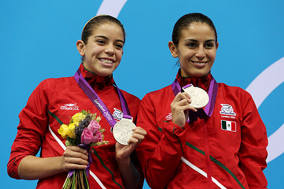Silver medallists Alejandra Orozco Loza and Paola Espinosa of Mexico
