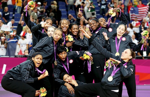 The United States players pose for a photo with their gold medals