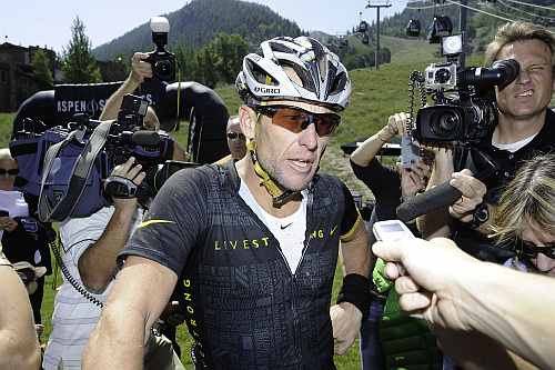 Lance Armstrong finishes the Power of Four Mountain Bike Race on Aspen Mountain