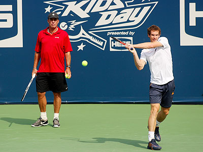 Andy Murray (right) practices as coach Ivan Lendl looks on